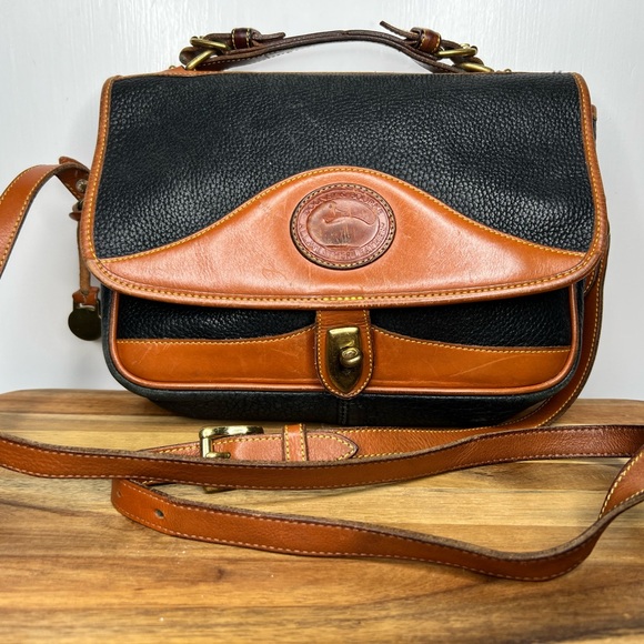 Dooney & Bourke Handbags - Vintage Dooney & Bourke All Weather Leather Crossbody Satchel Messenger bag.